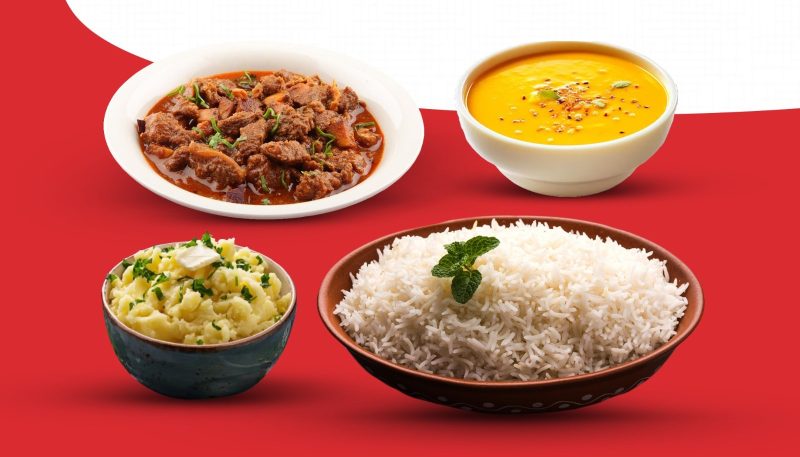 A hearty combo of tender beef curry with plain rice or naan, served with creamy daal and flavorful vorta.