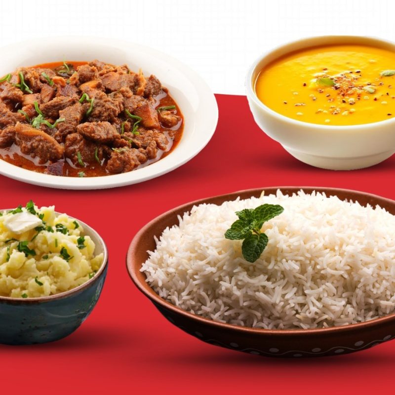 A hearty combo of tender beef curry with plain rice or naan, served with creamy daal and flavorful vorta.