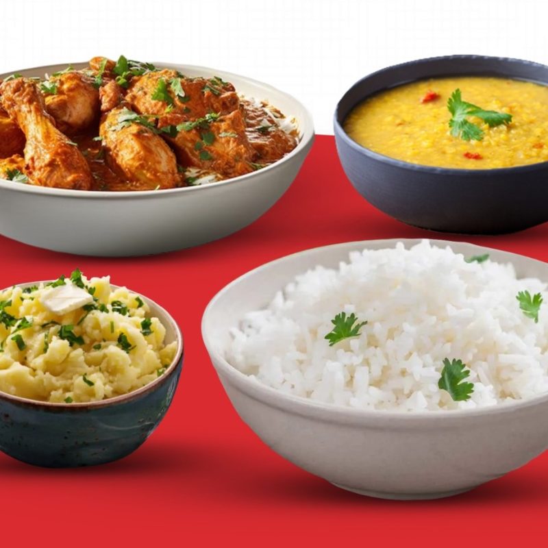 A delicious combo of chicken curry with plain rice or naan, paired with daal and spiced vorta for a flavorful meal.